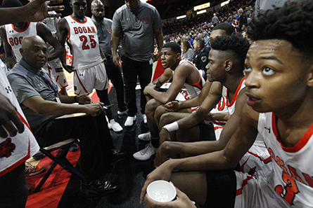 Inside view of Bogan team huddle during time out. 